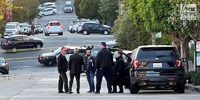 FBI investigators are seen outside the home of Nancy and Paul Pelosi where Paul was the victim of a violent home invasion, Friday, Oct. 28, 2022.