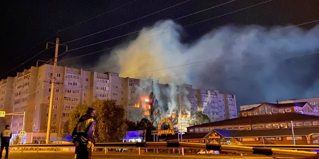 A view shows the site of a plane crash, after a Sukhoi Su-34 supersonic medium-range fighter-bomber plunged towards the residential building, in the southern city of Yeysk, Russia Oct. 17, 2022.  