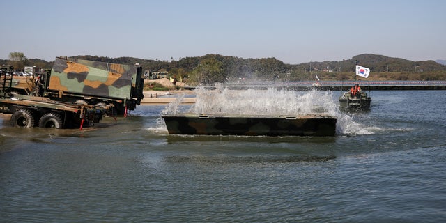 A part of the floating bridge is pictured as South Korean and U.S. soldiers take part in their joint river crossing operation drill in Yeoju, South Korea, October 19, 2022. REUTERS/Kim Hong-Ji