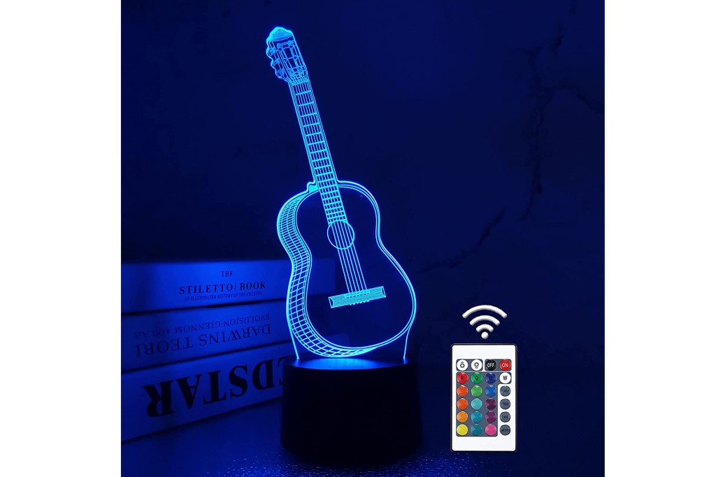 A blue LED lit up guitar night light and a rainbow remote 