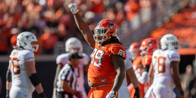 Oklahoma State Cowboys defensive end Tyler Lacy (89) reacts after a play during the first half against the Texas Longhorns on Oct 22, 2022, at Boone Pickens Stadium in Stillwater, Oklahoma.