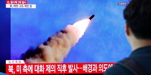 People watch a TV showing a file image of a North Korea's missile launch during a news program at the Seoul Railway Station in Seoul, South Korea, Tuesday, Sept. 10, 2019. 