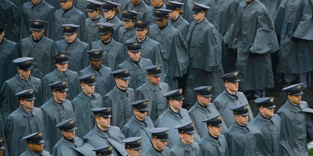 Army cadets march onto field ahead of an NCAA college football game between the Army and the Navy, Saturday, Dec. 14, 2019, in Philadelphia.