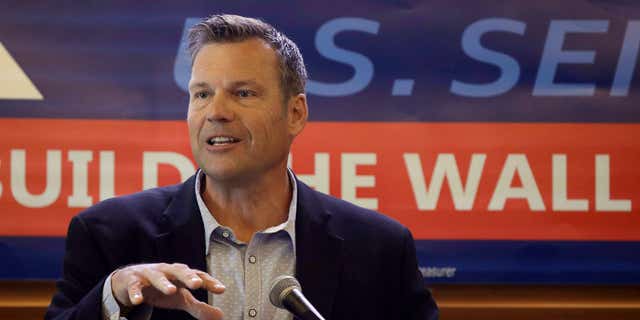 Former Kansas Secretary of State Kris Kobach addresses the crowd as he announces his candidacy for the Republican nomination for the U.S. Senate in Leavenworth, Kansas, on July 8, 2019.