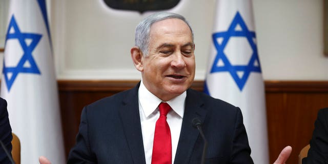 Israeli Prime Minister Benjamin Netanyahu chairs the weekly cabinet meeting in Jerusalem, Sunday, March. 8, 2020. (AP Photo/Oded Balilty, Pool)