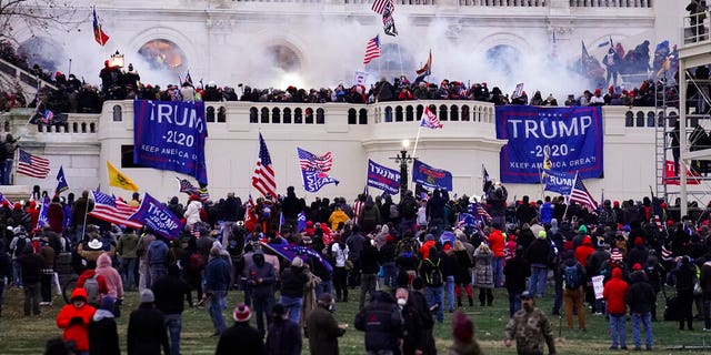 In this Jan. 6, 2021, file photo violent rioters, loyal to President Trump, storm the Capitol in Washington.