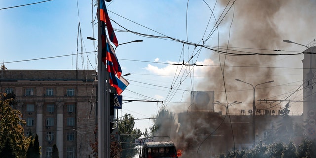 A vehicle on fire after shelling in Donetsk, an area controlled by Russian-backed separatist forces, in eastern Ukraine on Sept. 17, 2022.