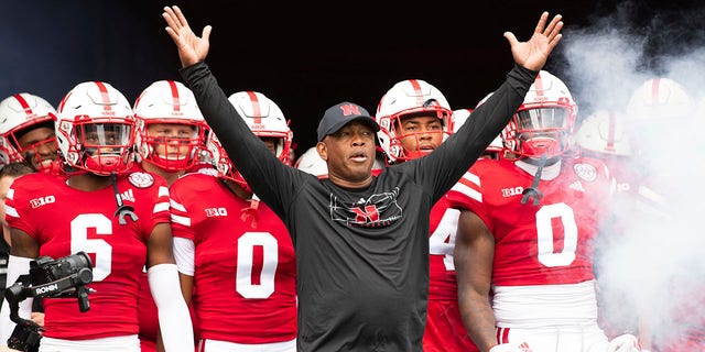 Nebraska interim head coach Mickey Joseph leads the team onto the field before an NCAA college football game against Oklahoma, Saturday, Sept. 17, 2022, in Lincoln, Nebraska. 