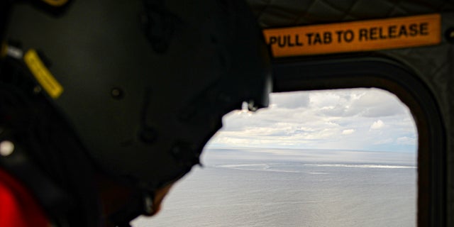 In this photo provided by the Armed Forces of Denmark, the crew in a helicopter of the Armed Forces monitors the gas leak, in the Baltic Sea, Thursday, Sept. 29, 2022.