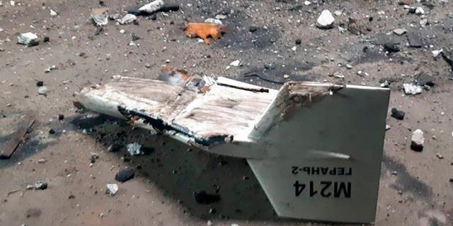 FILE - This undated photograph released by the Ukrainian military's Strategic Communications Directorate shows the wreckage of what Kyiv has described as an Iranian Shahed drone downed near Kupiansk, Ukraine. As protests rage at home, Iran's theocratic government is increasingly flexing its military muscle abroad. That includes supplying drones to Russia that now kill Ukrainian civilians, running drills in a border region with Azerbaijan and bombing Kurdish positions in Iraq. (Ukrainian military's Strategic Communications Directorate via AP, File)