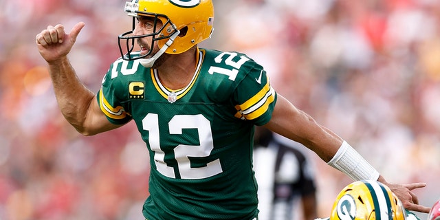 Aaron Rodgers of the Green Bay Packers calls an audible against the Tampa Bay Buccaneers during the second quarter at Raymond James Stadium Sept. 25, 2022, in Tampa, Fla.