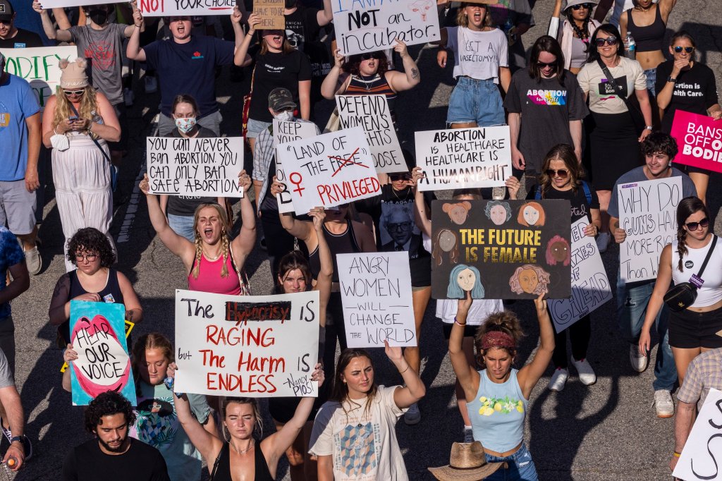 Hundreds of demonstrators rally and march in downtown Raleigh, N.C. in opposition to the U.S. Supreme Court's decision overturning Roe v. Wade. 