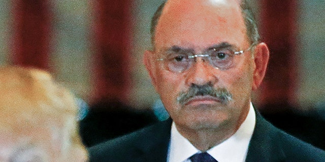 FILE PHOTO: Trump Organization chief financial officer Allen Weisselberg looks on as then-U.S. Republican presidential candidate Donald Trump speaks during a news conference at Trump Tower in Manhattan, New York, U.S., May 31, 2016. REUTERS/Carlo Allegri/File Photo