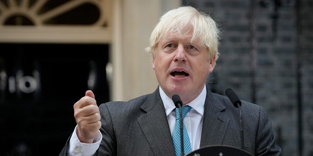 Outgoing British Prime Minister Boris Johnson speaks outside Downing Street in London, Tuesday, Sept. 6, 2022 before heading to Balmoral in Scotland, where he will announce his resignation to Britain's Queen Elizabeth II. Later on Tuesday Liz Truss will formally become Britain's new Prime Minister after an audience with the Queen. (AP Photo/Kirsty Wigglesworth)