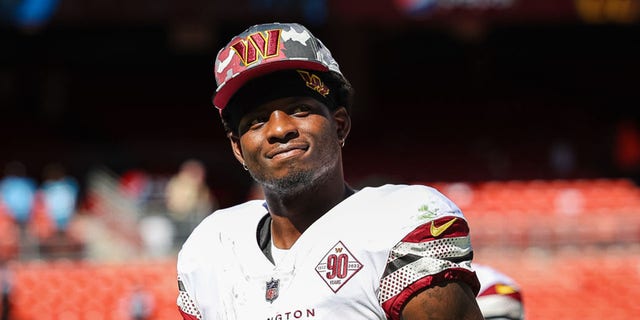 Brian Robinson Jr. of the Washington Commanders looks on during a preseason game against the Carolina Panthers at FedEx Field on Aug. 13, 2022, in Landover, Maryland.