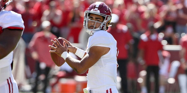 Alabama quarterback Bryce Young (9) drops back to pass against Arkansas during the first half of an NCAA college football game Saturday, Oct. 1, 2022, in Fayetteville, Ark. 