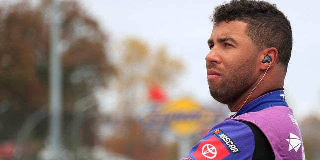 Bubba Wallace watches the action from pit road during qualifying for the NASCAR Cup Series Playoff Xfinity 500 on October 29, 2022 at Martinsville Speedway in Martinsville, VA.