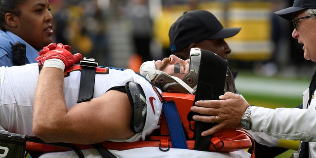 Tampa Bay Buccaneers tight end Cameron Brate is carted off the field after being injured during the second half of an NFL football game against the Pittsburgh Steelers in Pittsburgh, Sunday, Oct. 16, 2022. 