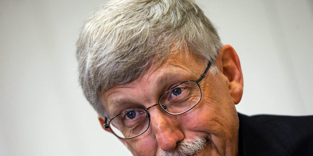 In this Aug. 17, 2009, file photo, Dr. Francis Collins, former director of the National Institutes of Health, speaks at NIH headquarters in Bethesda, Md.   