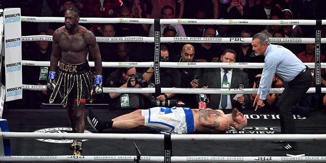 Robert Helenius lays on the ground in the 1st round of their 12-round WBC World Heavyweight Title Eliminator fight at Barclays Center in Brooklyn, New York, on October 15, 2022.