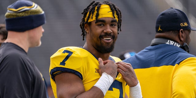 Donovan Edwards, #7 of the Maize Team, looks on during the 4th quarter of the spring football game at Michigan Stadium on April 2, 2022 in Ann Arbor, Michigan. 