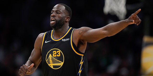 Golden State Warriors forward Draymond Green (23) reacts during the second quarter of Game 4 of basketball's NBA Finals against the Boston Celtics, Friday, June 10, 2022, in Boston.