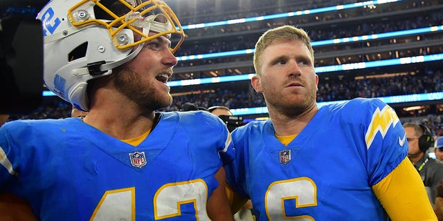 Oct 17, 2022; Inglewood, California, USA; Los Angeles Chargers place kicker Dustin Hopkins (6) and linebacker Troy Reeder (42) celebrate the overtime victory against the Denver Broncos at SoFi Stadium. 