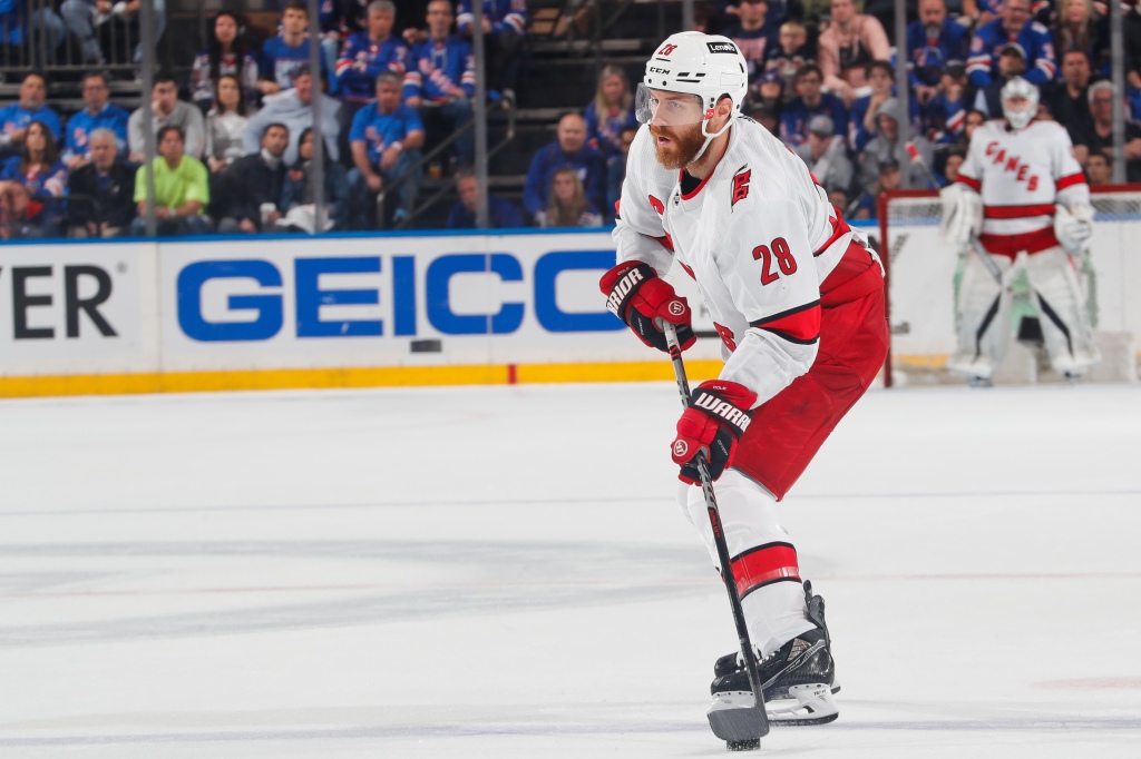  Ian Cole #28 of the Carolina Hurricanes skates the puck along the blue line during the second period of a game against the New York Rangers in Game Six of the Second Round of the 2022 Stanley Cup Playoffs at Madison Square Garden on May 28, 2022 in New York City.