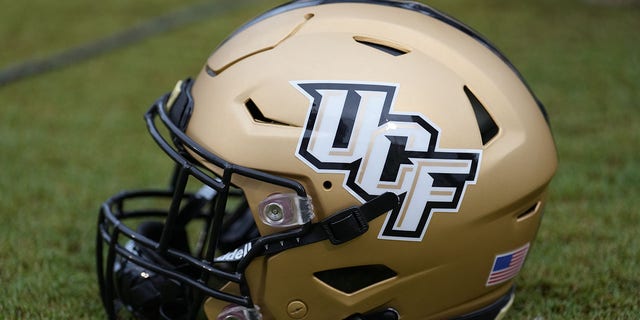 A UCF helmet sits on a sideline during a game between the Louisville Cardinals and the University of Central Florida Knights Sept. 9, 2022, at Bright House Networks Stadium in Orlando, Fla.