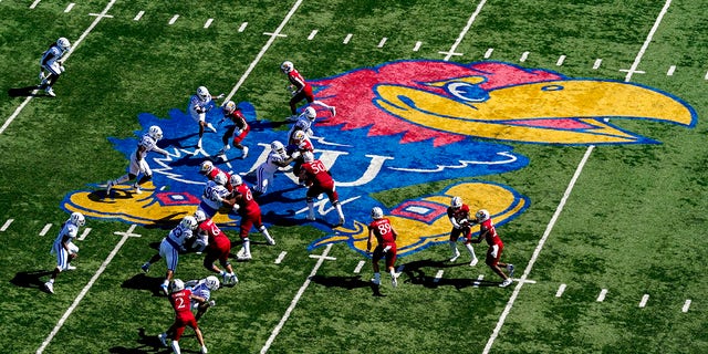 The Kansas Jayhawks offense runs the ball against the Duke Blue Devils defense during the first half at David Booth Kansas Memorial Stadium Sept. 24, 2022 in Lawrence, Kan. 