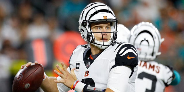 Cincinnati Bengals quarterback Joe Burrow, #9, looks to pass during the game against the Miami Dolphins and the Cincinnati Bengals on Sept. 29, 2022, at Paycor Stadium in Cincinnati.