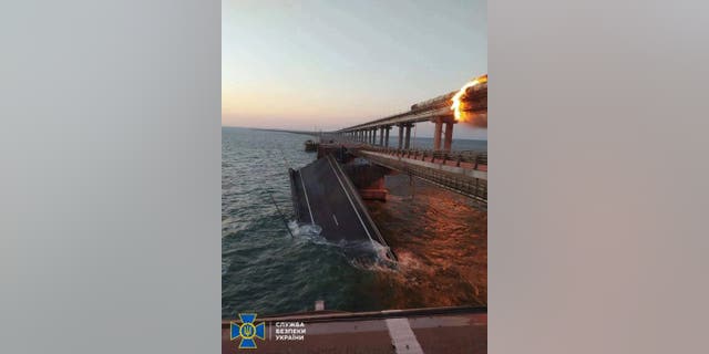 Explosion causes fire at the Kerch bridge, also known as the Crimean Bridge, in the Kerch Strait, Crimea, Oct. 8, 2022. 