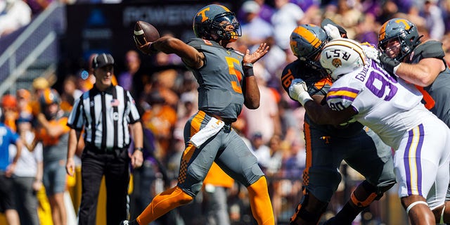 Tennessee Volunteers quarterback Hendon Hooker, #5, throws a touchdown pass during a game between the LSU Tigers and the Tennessee Volunteers on Oct. 8, 2022, at Tiger Stadium in Baton Rouge, Louisiana. 