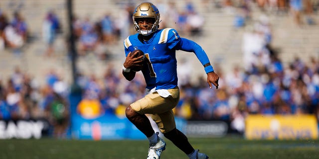 UCLA Bruins quarterback Dorian Thompson-Robinson, #1, runs with the ball during the college football game between the Utah Utes and the UCLA Bruins on Saturday, Oct. 8, 2022 at the Rose Bowl in Pasadena, California.