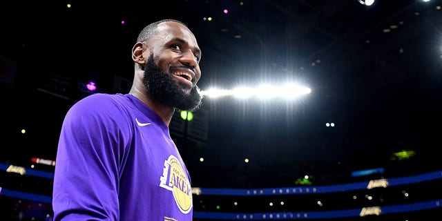 Laker LeBron James smiles before a game with the Clippers at Crypto Arena in Los Angeles Thursday. 