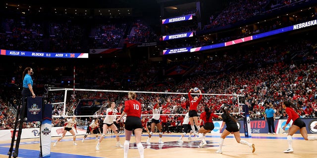 Nicklin Hames #1 of the Nebraska Cornhuskers sets the ball against the Wisconsin Badgers during the Division I Women's Volleyball Championship on Dec. 18, 2021, in Columbus, Ohio. 