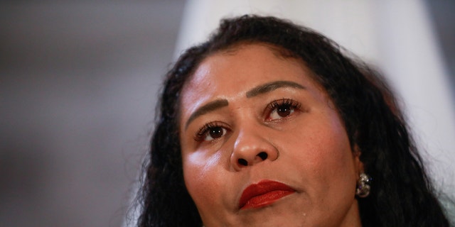 San Francisco Mayor London Breed listens at a press conference at City Hall on Wednesday, Feb. 16, 2022, in San Francisco.