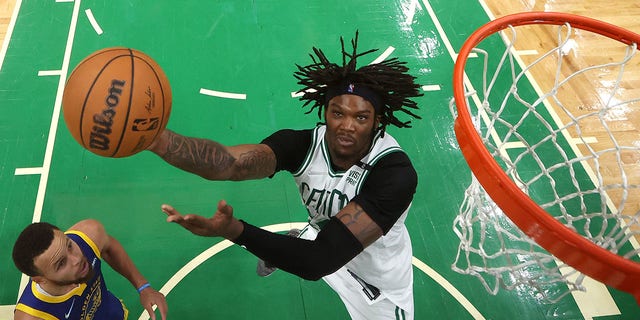 Robert Williams III (44) of the Boston Celtics shoots against the Golden State Warriors in Game 6 of the 2022 NBA Finals at TD Garden June 16, 2022, in Boston. 