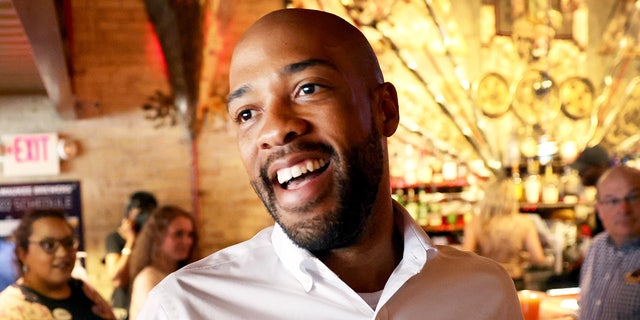 Democratic Wisconsin Lt. Gov. Mandela Barnes greets guests during a campaign event at The Wicked Hop in Milwaukee, Wisconsin, on Aug. 7, 2022.