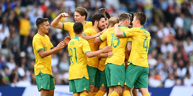 Mitchell Duke of the Socceroos celebrates after scoring a goal during a match between the New Zealand All Whites and Australia Socceroos at Eden Park Sept. 25, 2022, in Auckland, New Zealand. 