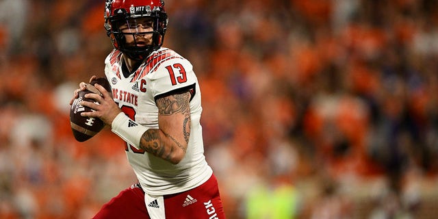 Devin Leary of the North Carolina State Wolfpack looks to pass in the second quarter against the Clemson Tigers at Memorial Stadium Oct. 1, 2022, in Clemson, S.C. 