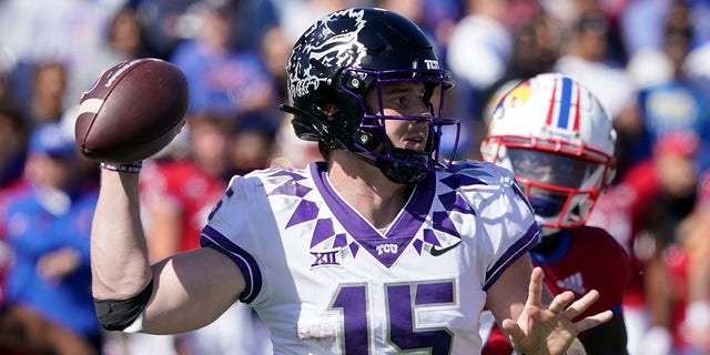 Quarterback Max Duggan of the TCU Horned Frogs passes in the second half against the Kansas Jayhawks at David Booth Kansas Memorial Stadium Oct. 8, 2022, in Lawrence, Kan. 