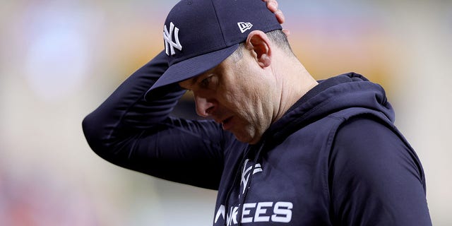 Manager Aaron Boone #17 of the New York Yankees reacts against the Houston Astros during the eighth inning in game two of the American League Championship Series at Minute Maid Park on Oct. 20, 2022 in Houston, Texas. 