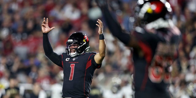 Kyler Murray, #1 of the Arizona Cardinals, celebrates after handing off for a touchdown during the second half of a game against the New Orleans Saints during a game at State Farm Stadium on Oct. 20, 2022 in Glendale, Arizona. 