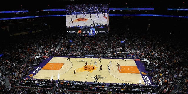 Action during the second half of the NBA game between the Phoenix Suns and the Dallas Mavericks at Footprint Center on October 19, 2022, in Phoenix, Arizona. The Suns defeated the Mavericks 107-105. 