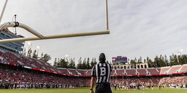 Back Judge Justin Nelson watches a field goal attempt by Joshua Karty, #43 of the Stanford Cardinal, during the third quarter of an NCAA Pac-12 college football game against the Arizona State Sun Devils on Oct. 22, 2022 at Stanford Stadium in Palo Alto, California.  