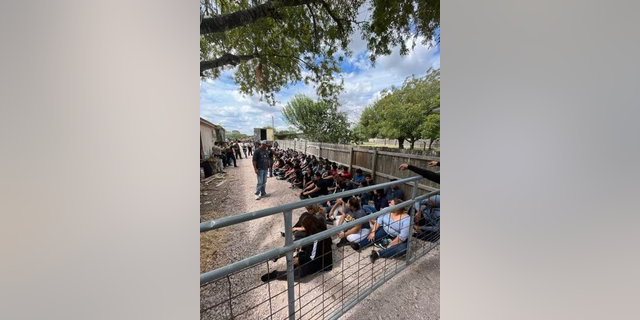 These migrants were rescued from a tractor trailer.