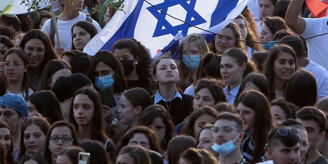 Israelis participate in a rally calling for the release of Israeli soldiers and civilians being held by Hamas in Gaza, In front of the Prime Minister's office in Jerusalem, Wednesday, May 19, 2021.