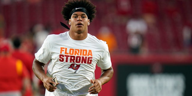 Tampa Bay Buccaneers' Joe Tryon-Shoyinka wears a "Florida Strong" T-shirt before the game against the Kansas City Chiefs on Oct. 2, 2022, in Tampa, Florida.