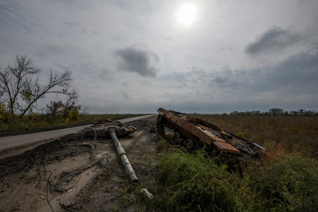 A destroyed Russian tank is seen on a road, amid Russia's attack on Ukraine, in the Kharkiv region on Oct. 2, 2022.  